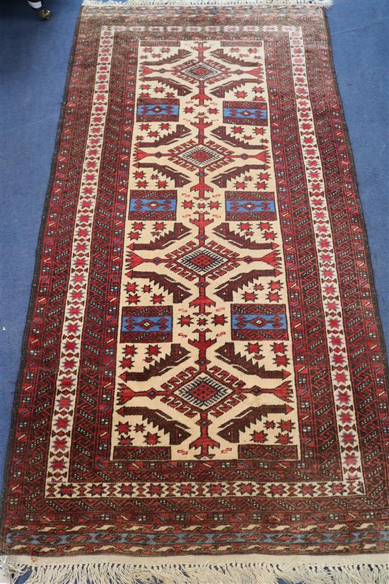 A Soumak cream and red ground rug, 190 x 96cm